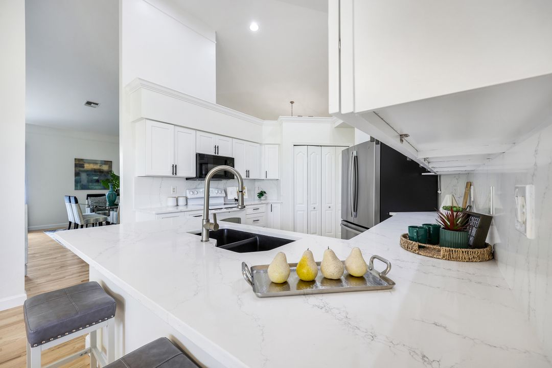 2237 Heritage Greens Dr, Naples, FL 34119