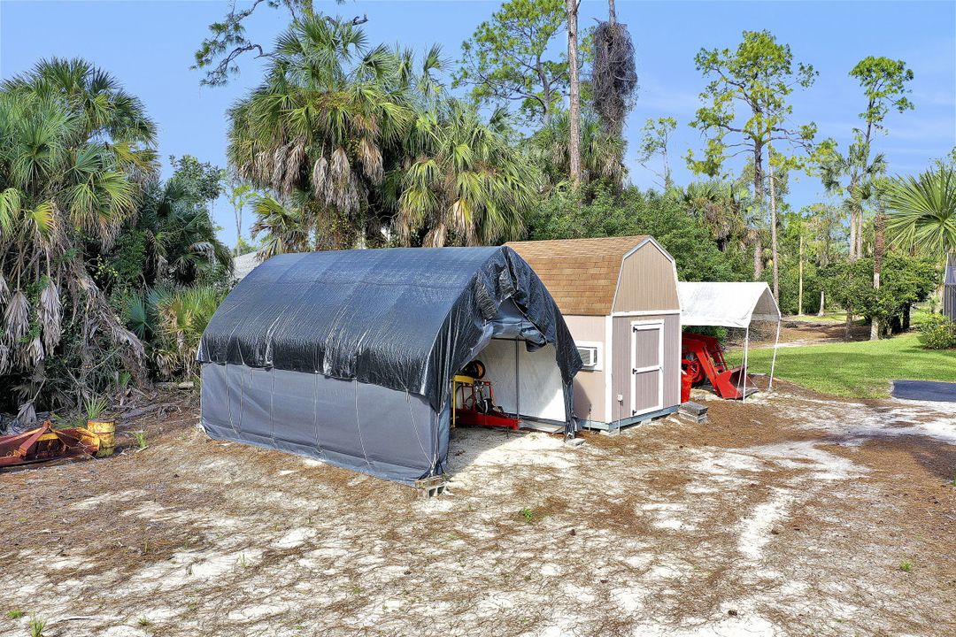 5980 Hidden Oaks Ln, Naples, FL 34119