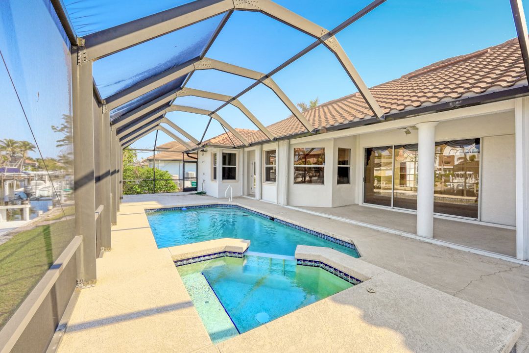 718 Nautilus Ct, Marco Island, FL 34145