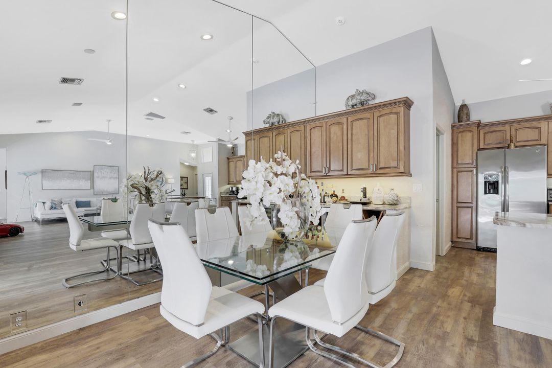 6080 Cypress Hollow Way, Naples, FL 34109