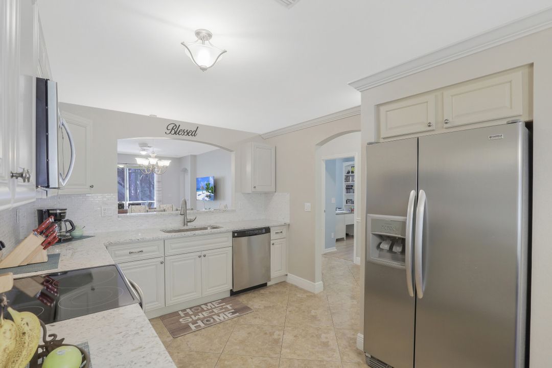 7782 Berkshire Pines Dr, Naples, FL 34104