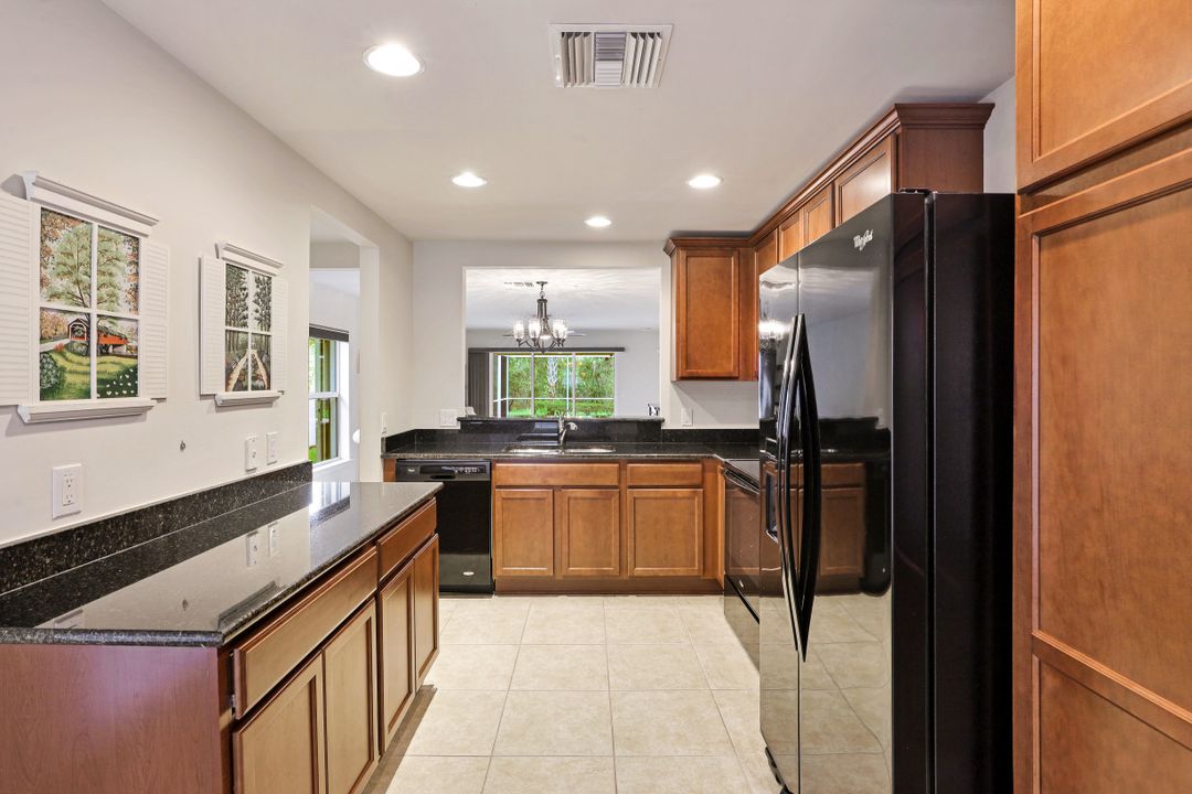 8458 Karina Ct, Naples, FL 34114