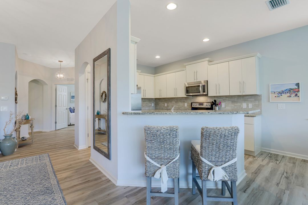 8843 Nautical Landing Cir #101, Naples, FL 34120