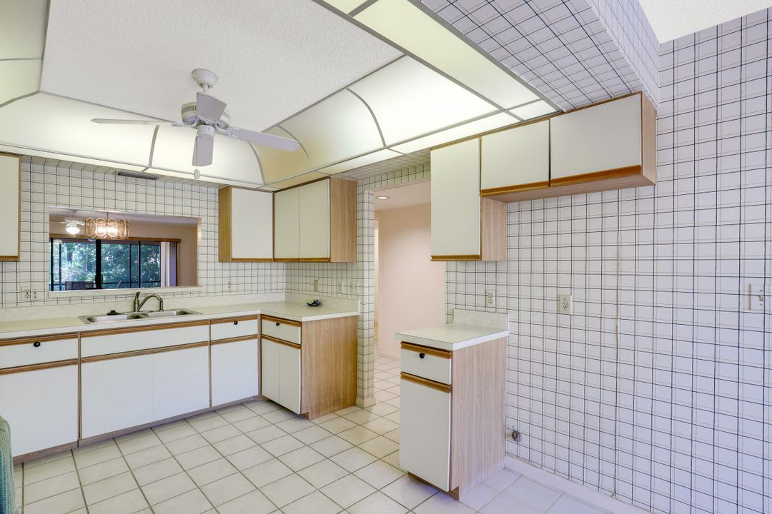 15330 Cedarwood Ln, Naples, FL 34110