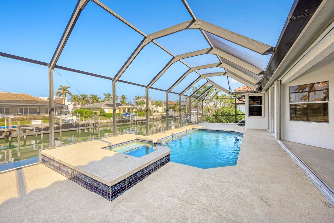 718 Nautilus Ct, Marco Island, FL 34145