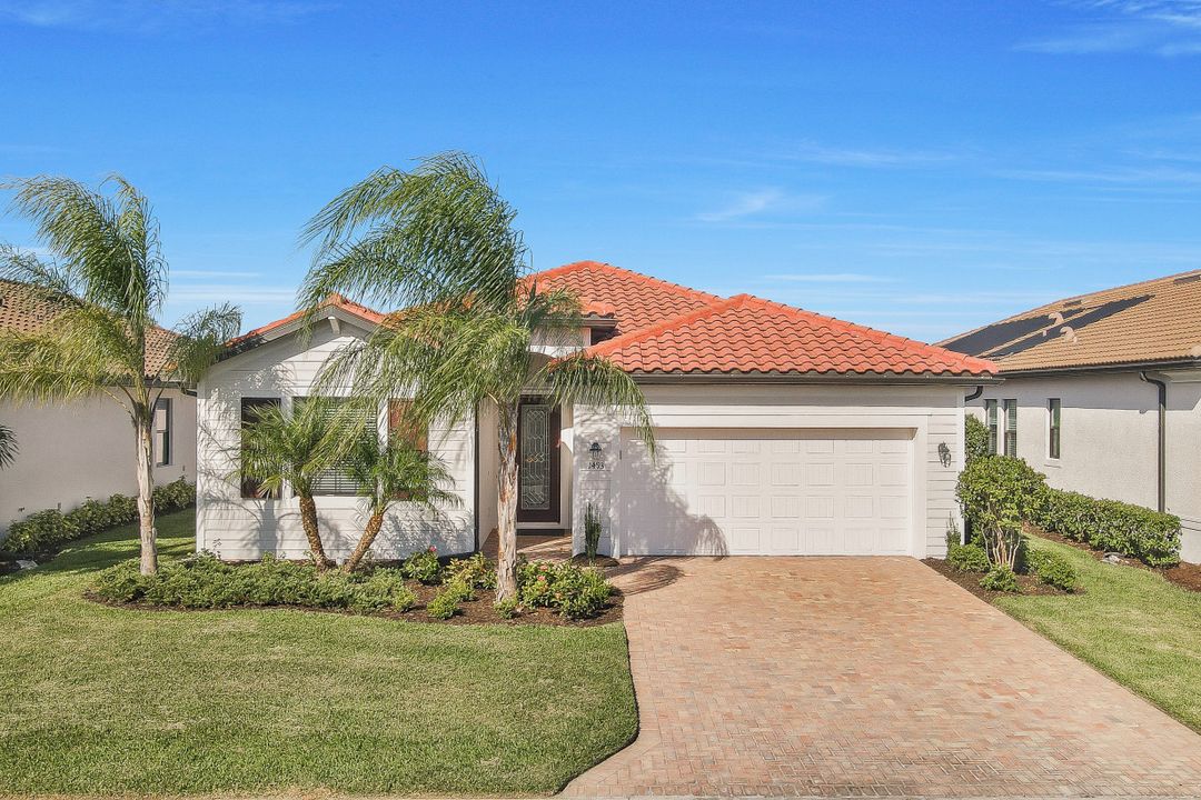 1493 Artesia Dr W, Naples, FL 34113