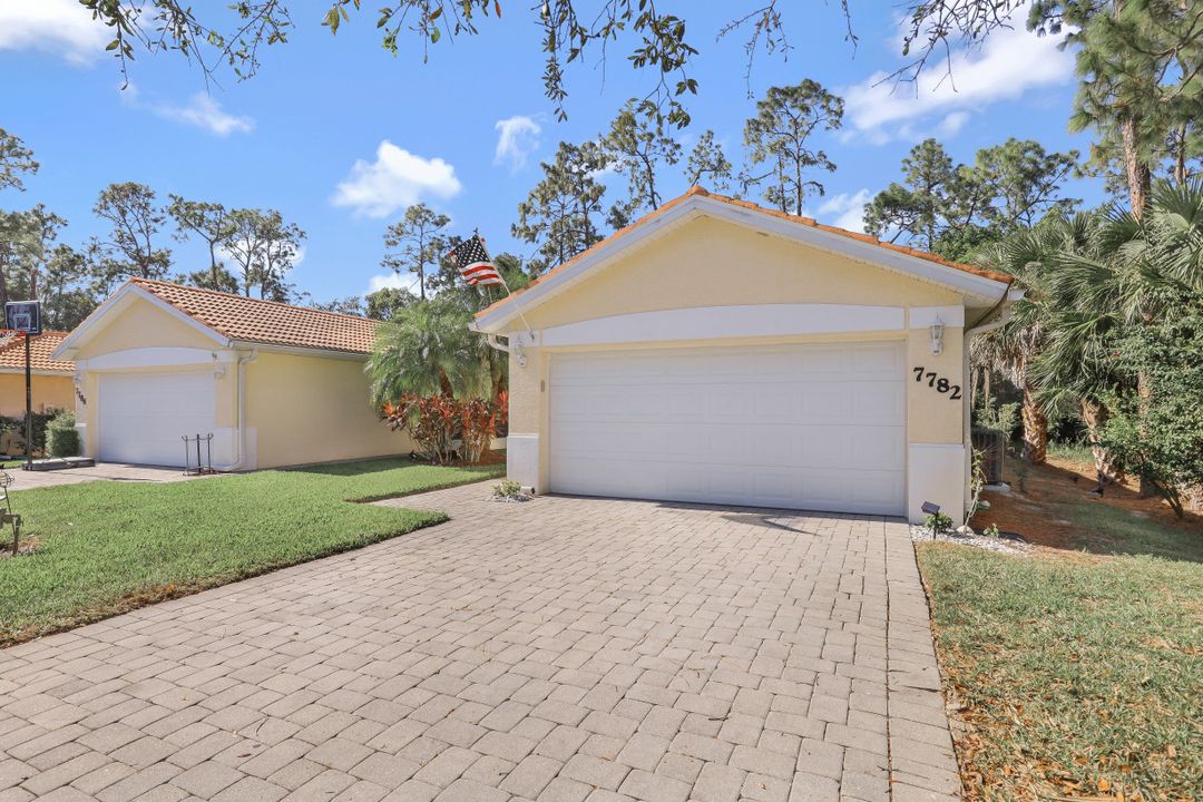 7782 Berkshire Pines Dr, Naples, FL 34104