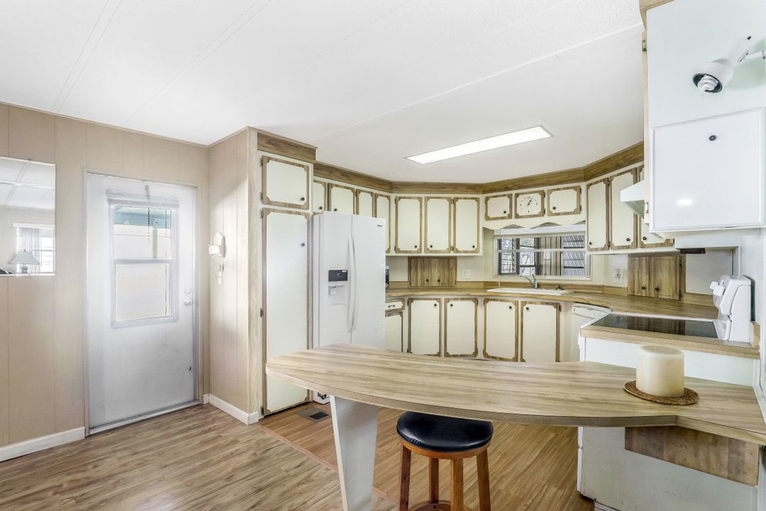 56 Palos Dr, Naples, FL 34104