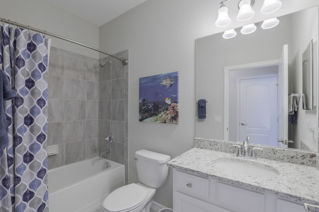 1493 Artesia Dr W, Naples, FL 34113