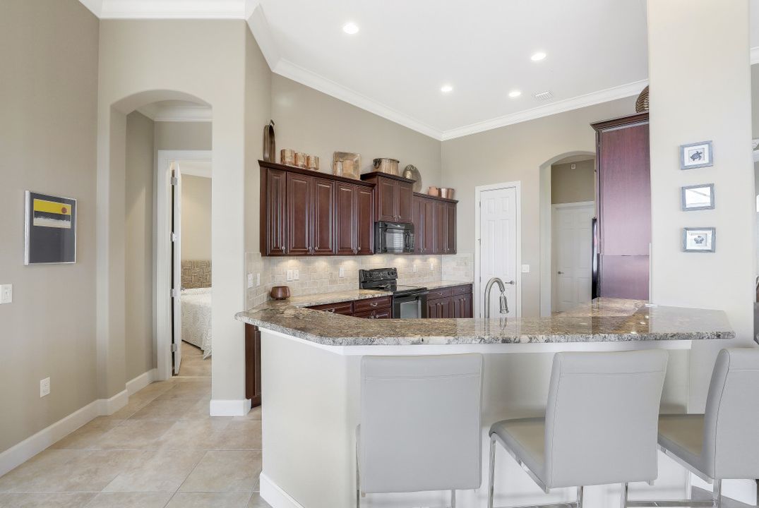 9424 Copper Rock Ct, Naples, FL 34120