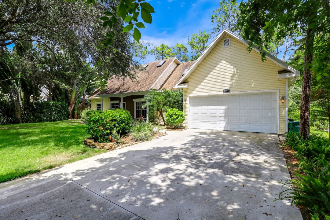 5700 Cypress Hollow Way, Naples, FL 34109