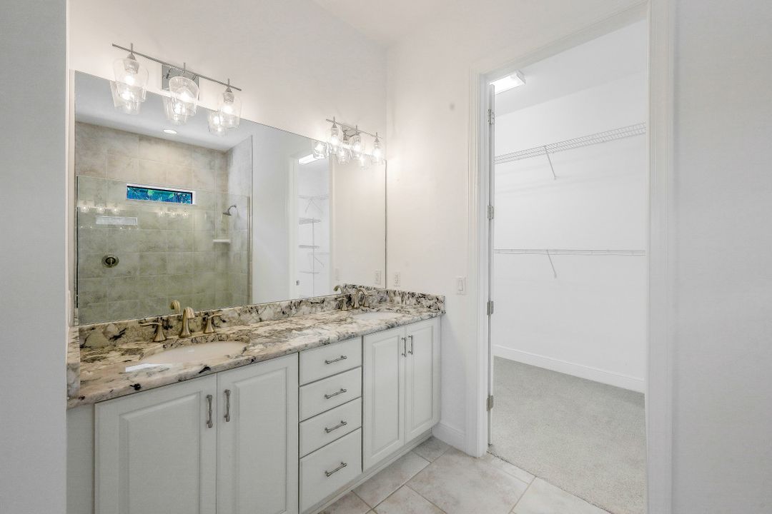 4098 Raffia Dr, Naples, FL 34119