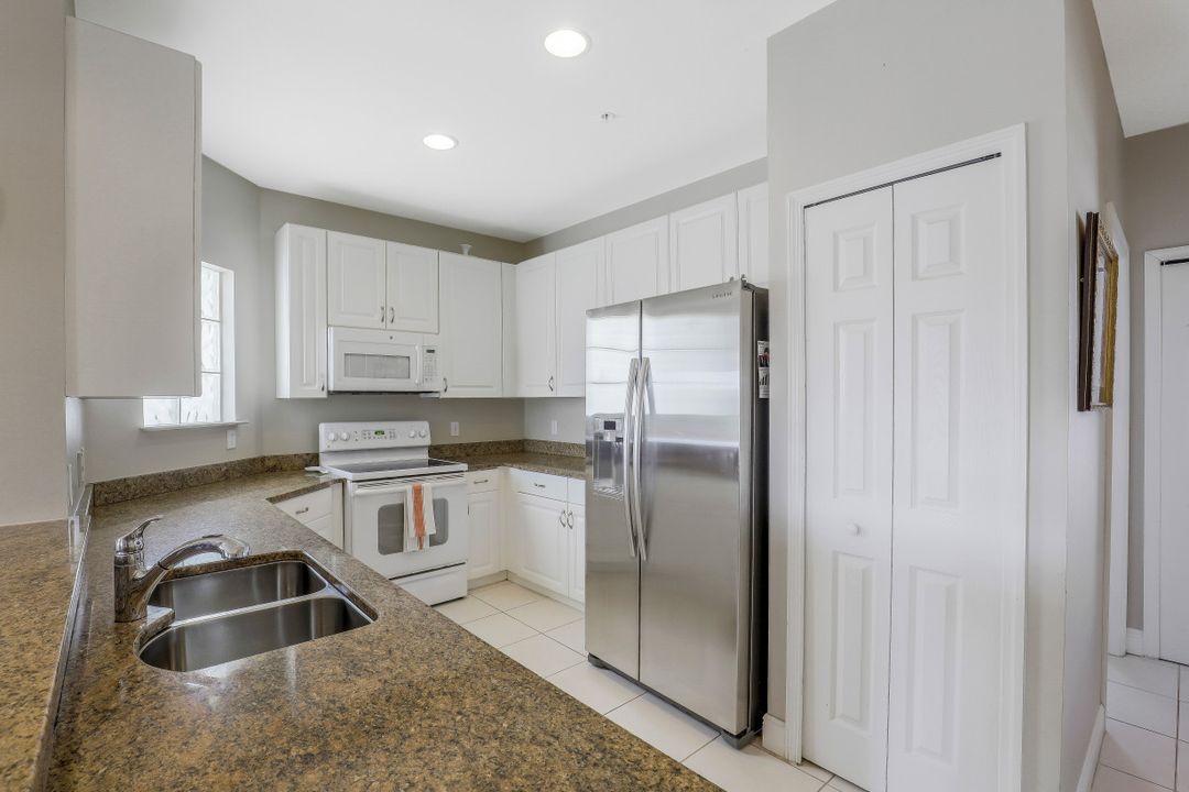 1410 Sweetwater Cove #204, Naples, FL 34110