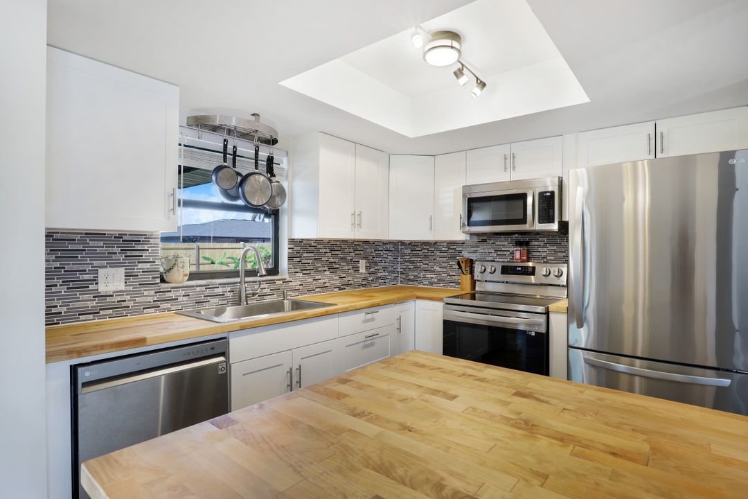 1303 SE 14th Terrace, Cape Coral, FL 33990