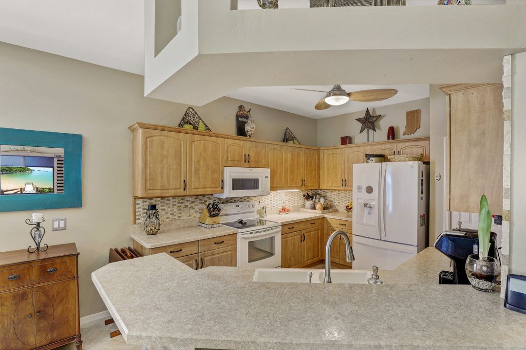 200 Stanhope Cir, Naples, FL 34104