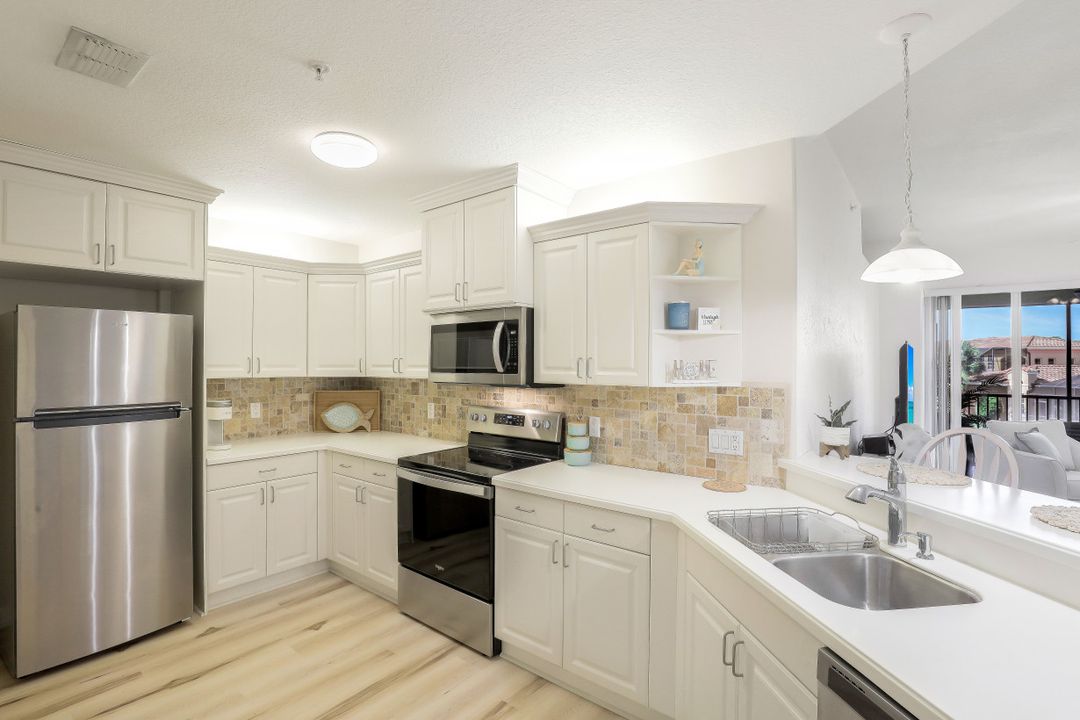 8573 Via Garibaldi Cir #203, Estero, FL 33928