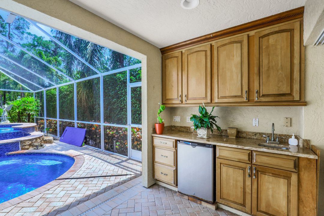 6080 Cypress Hollow Way, Naples, FL 34109