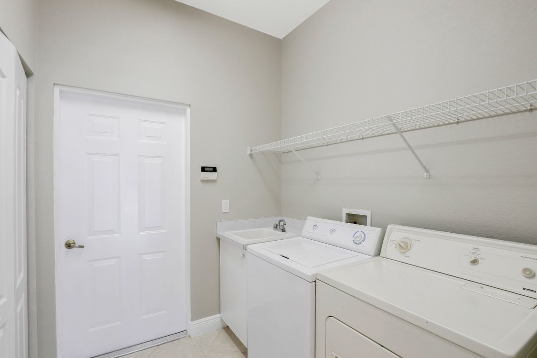 8039 Tauren Ct, Naples, FL 34119