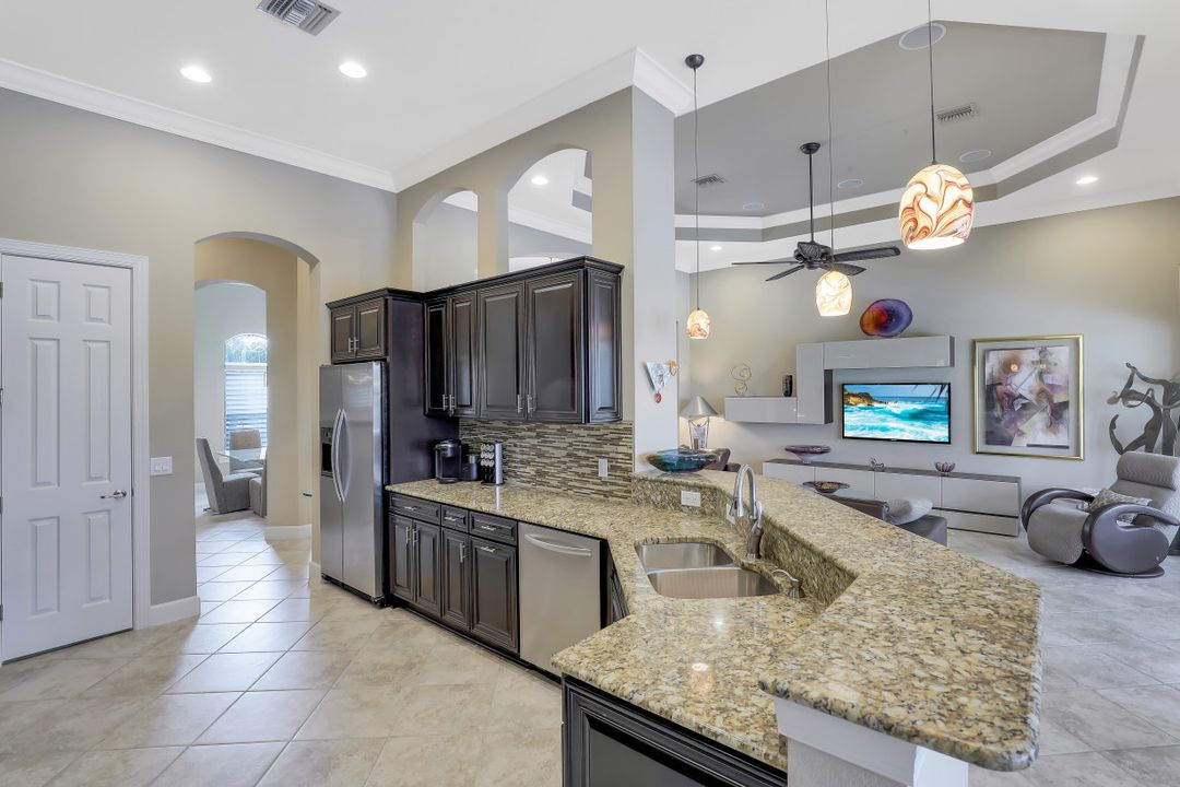 9403 Copper Rock Ct, Naples, FL 34120