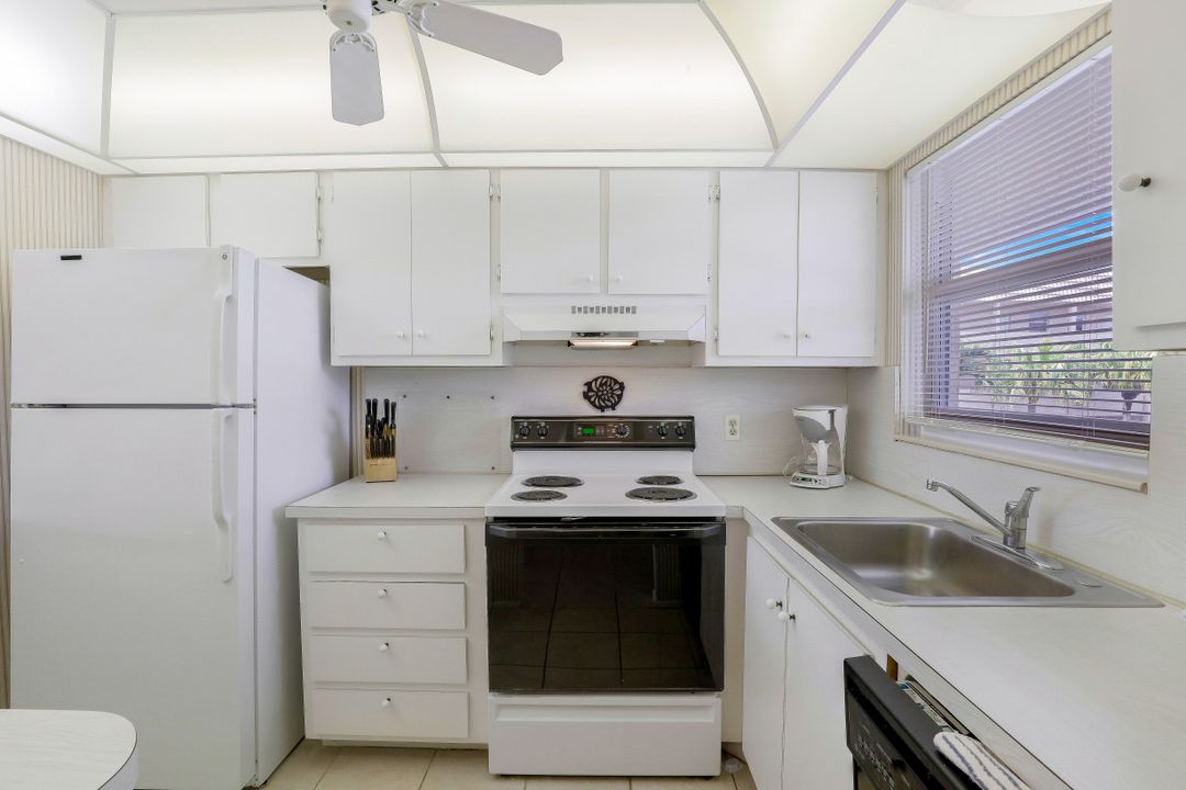 200 Forest Lakes Blvd #203, Naples, FL 34105