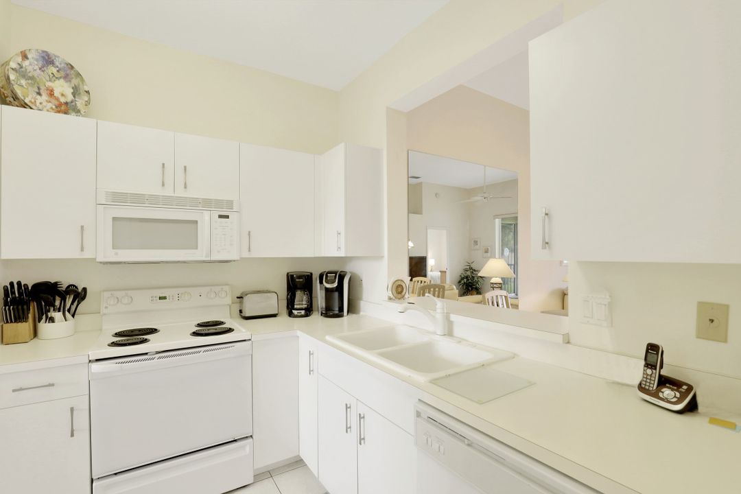 2310 Carrington Ct #202, Naples, FL 34109