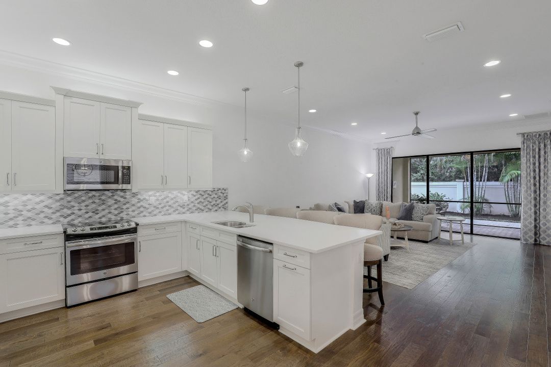 13395 Silktail Dr, Naples, FL 34109