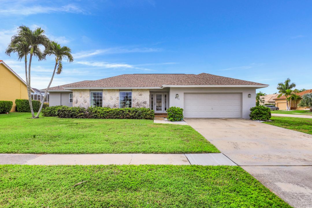 911 Tulip Ct, Marco Island, FL 34145
