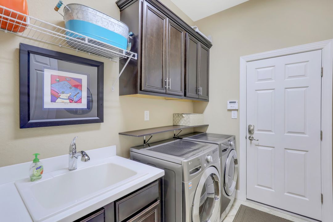 9403 Copper Rock Ct, Naples, FL 34120