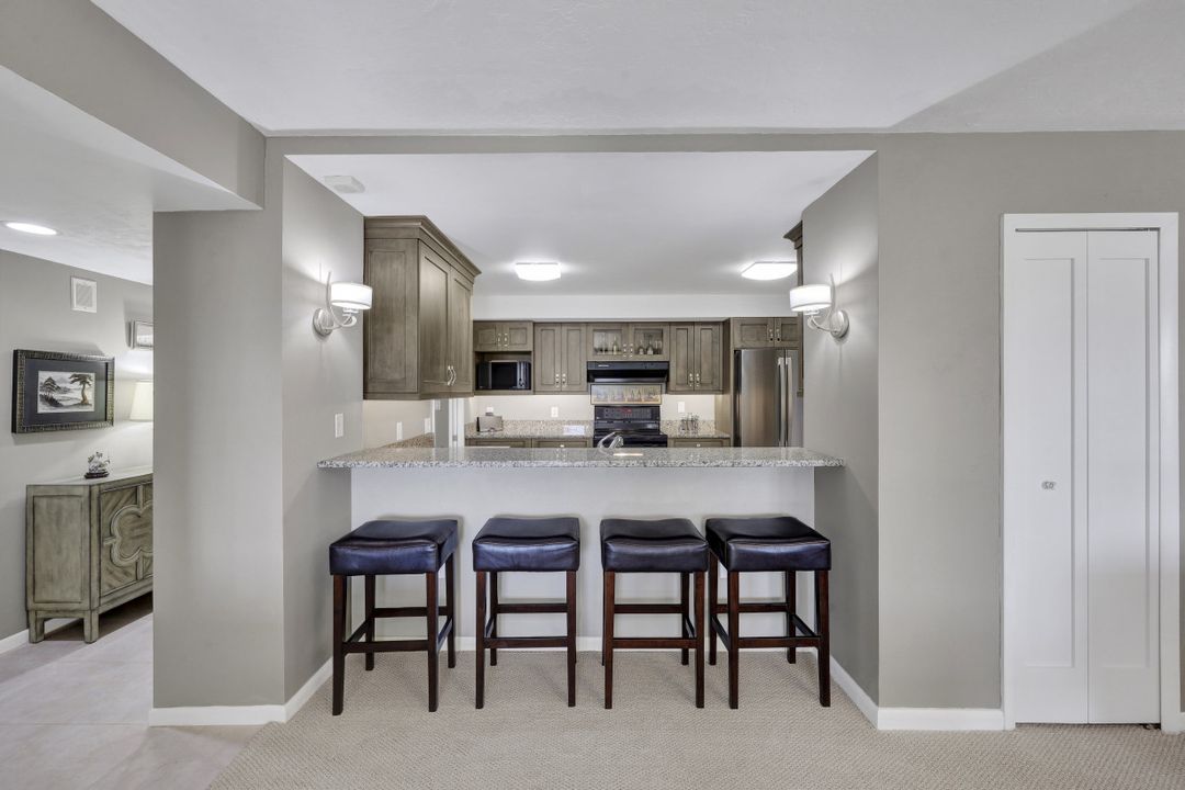 5601 Turtle Bay Dr #203, Naples, FL 34108