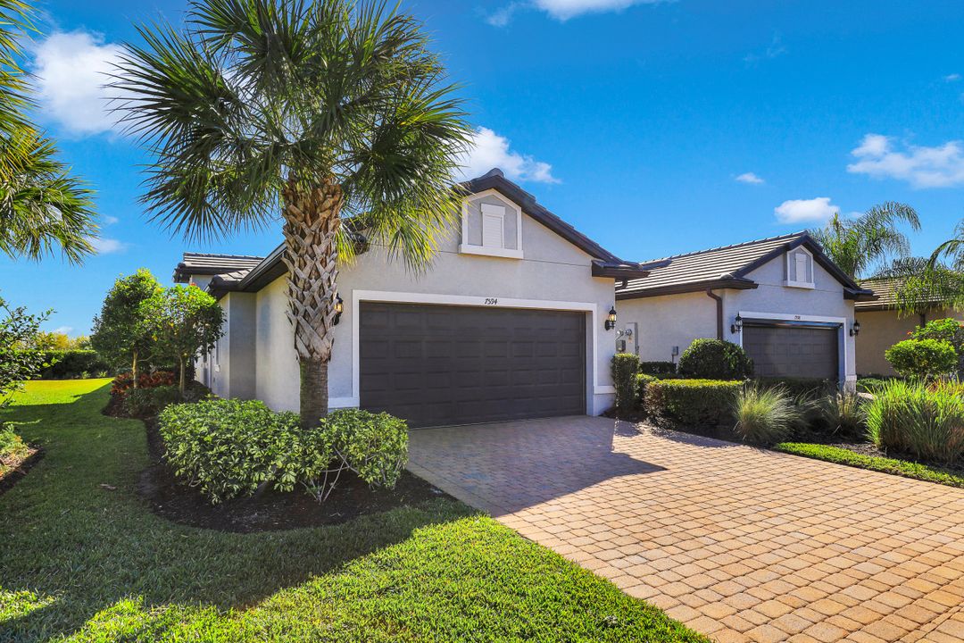 7594 Jacaranda Ln, Naples, FL 34114