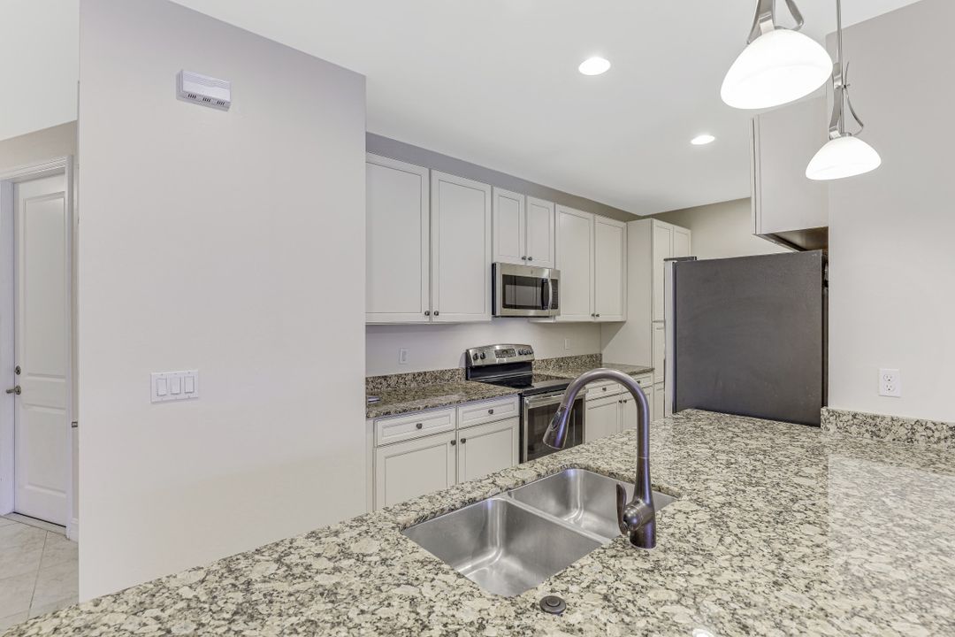 7754 Bristol Cir, Naples, FL 34120