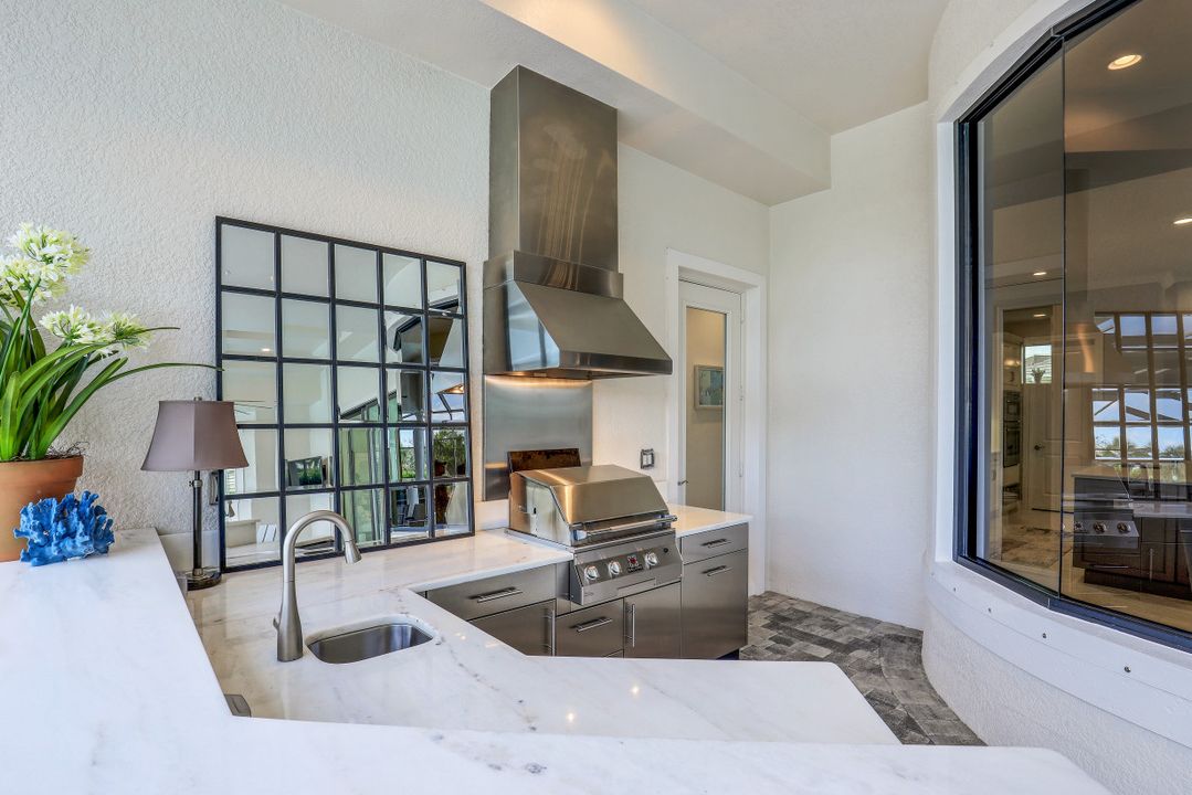 9011 Arrezo Ct, Naples, FL 34119