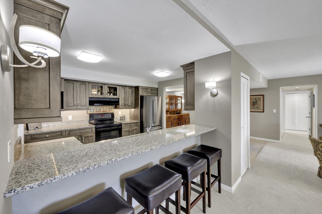 5601 Turtle Bay Dr #203, Naples, FL 34108