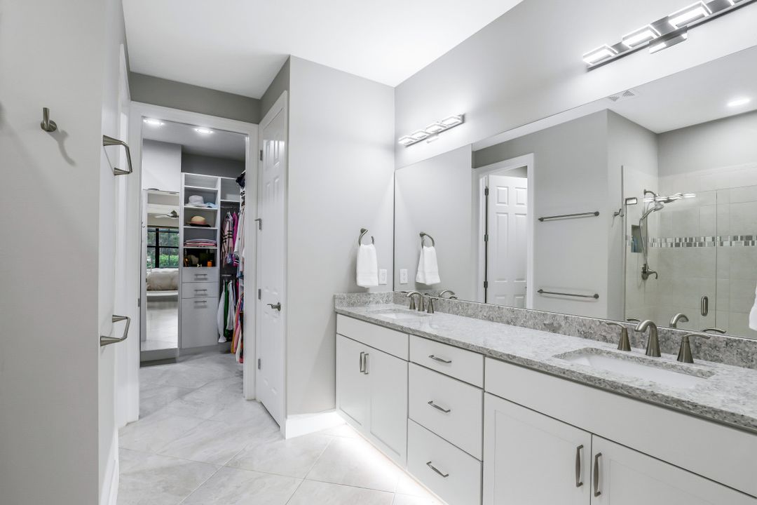 7682 Jacaranda Ln, Naples, FL 34114