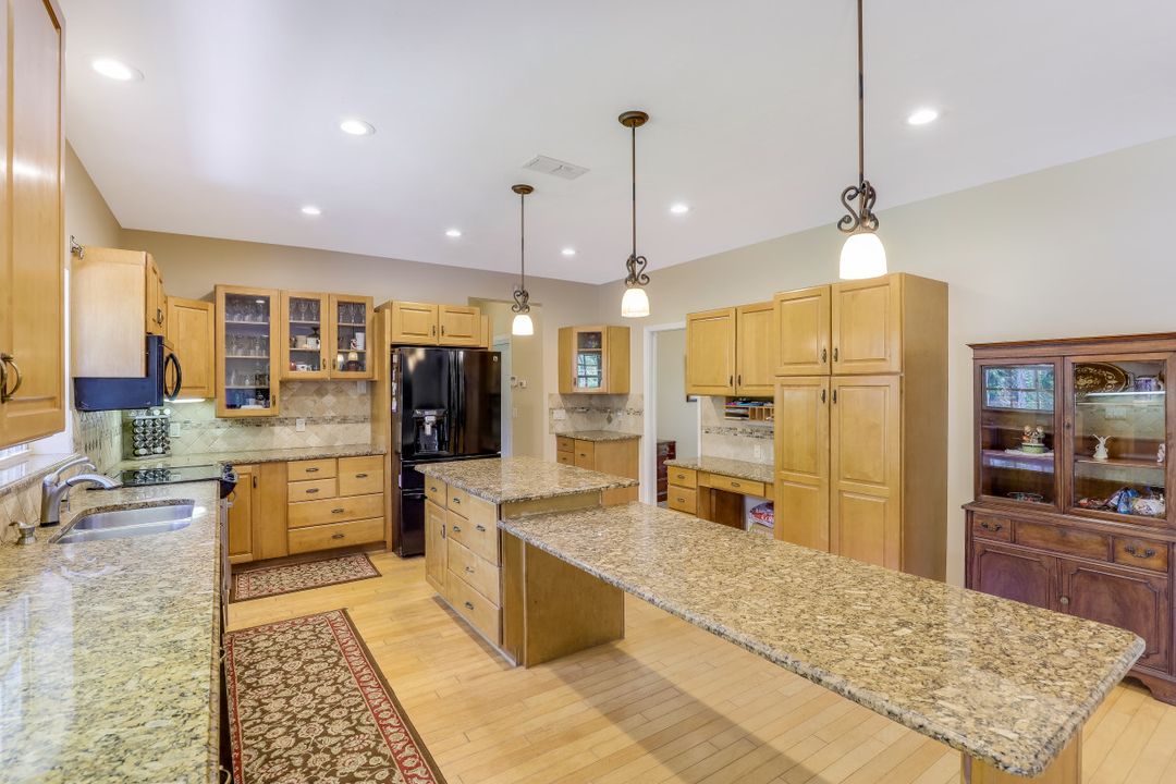 5700 Cypress Hollow Way, Naples, FL 34109