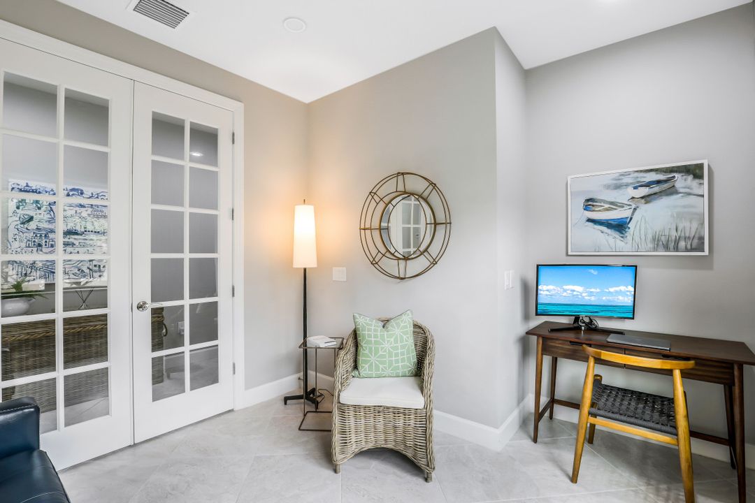 7682 Jacaranda Ln, Naples, FL 34114