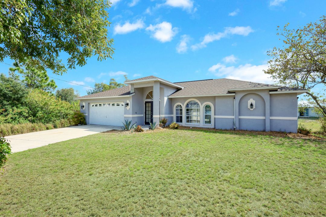 591 Pierre Cir, Lehigh Acres, FL 33974