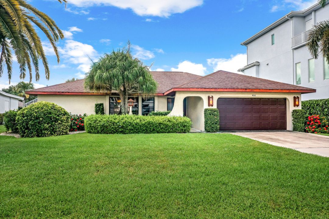 466 Tradewinds Ave, Naples, FL 34108