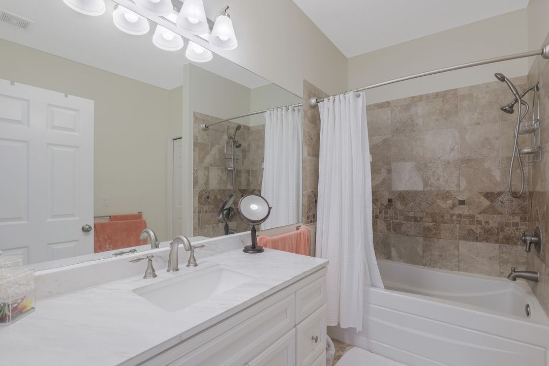 7782 Berkshire Pines Dr, Naples, FL 34104