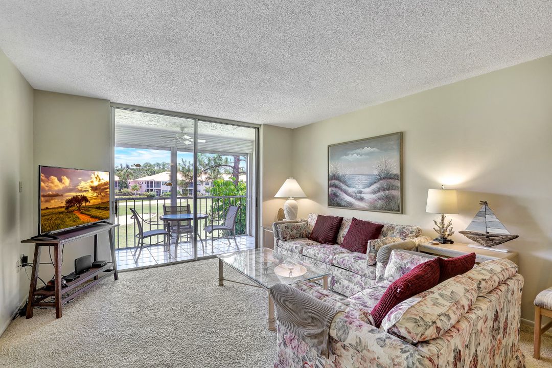 190 Turtle Lake Ct #203, Naples, FL 34105