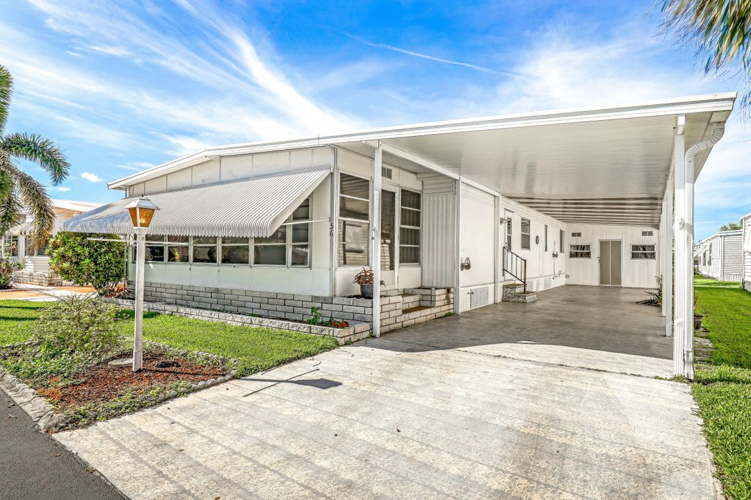 56 Palos Dr, Naples, FL 34104