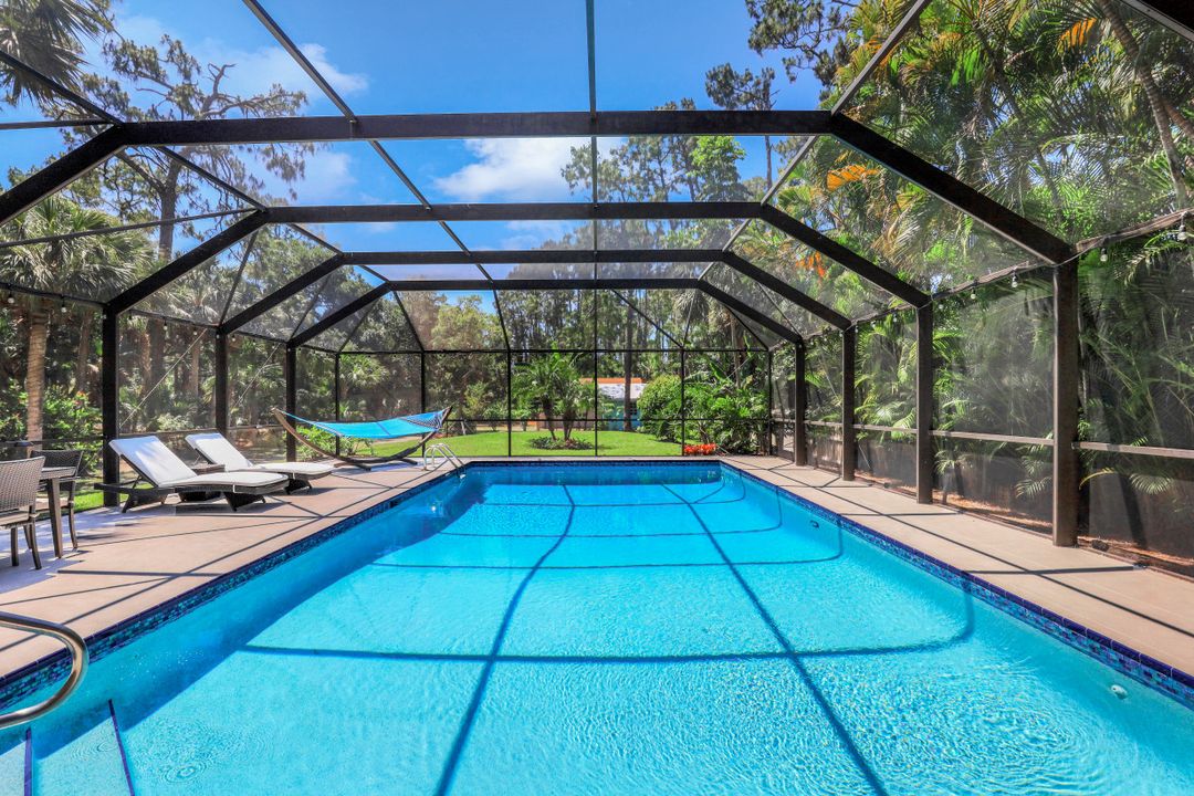 6060 Autumn Oaks Ln, Naples, FL 34119