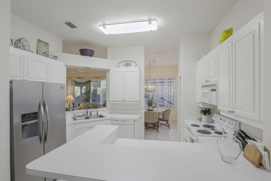 1090 Egrets Walk Cir #202, Naples, FL 34108