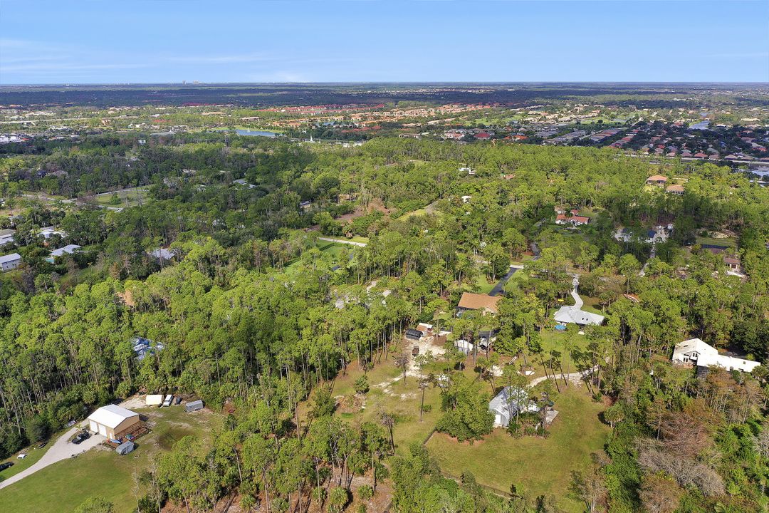 5980 Hidden Oaks Ln, Naples, FL 34119