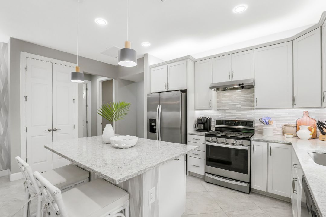 7682 Jacaranda Ln, Naples, FL 34114