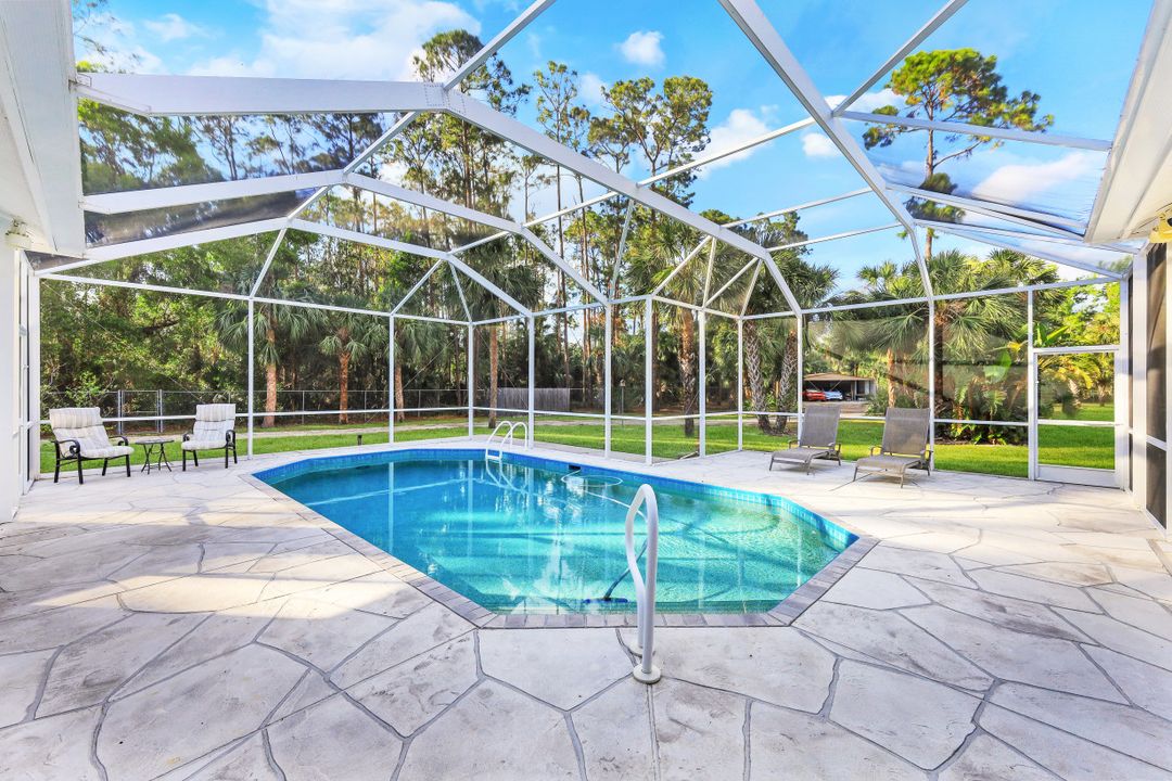 6087 Spanish Oaks Ln, Naples, FL 34119