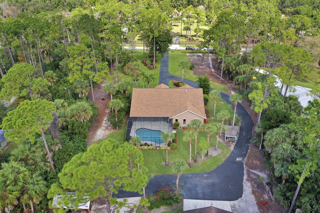 5980 Hidden Oaks Ln, Naples, FL 34119