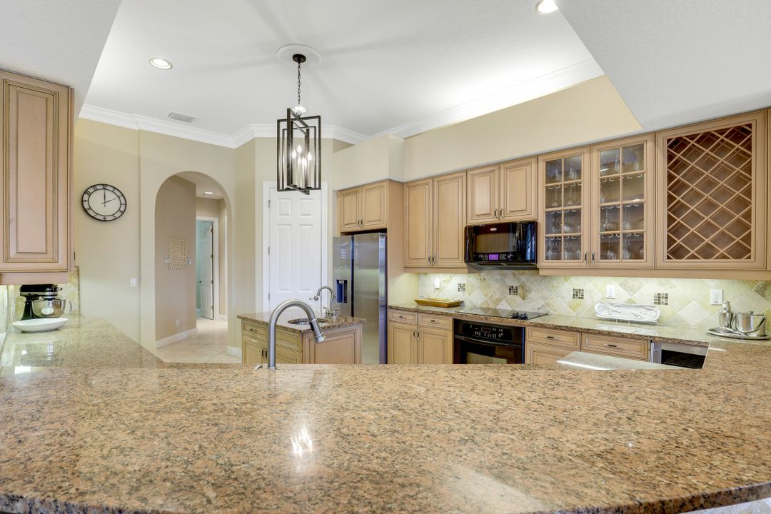 8733 Hideaway Harbor Ct, Naples, FL 34120