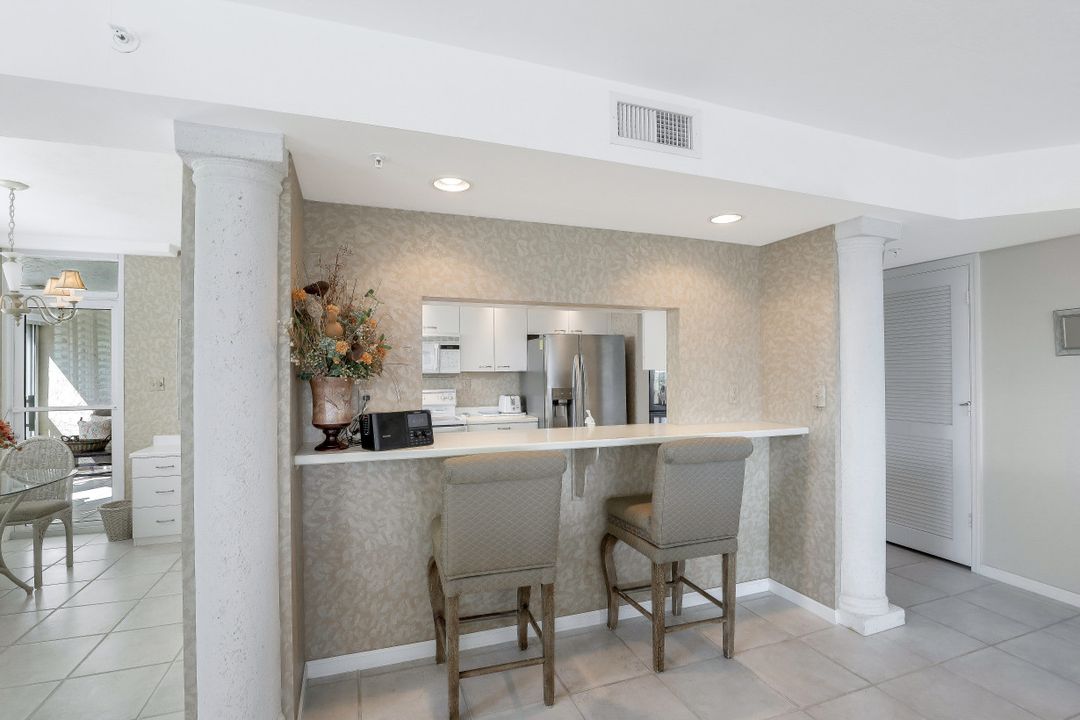 21 Bluebill Ave #404, Naples, FL 34108