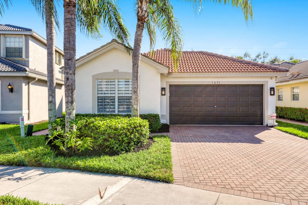1671 Triangle Palm Terrace, Naples, FL 34119